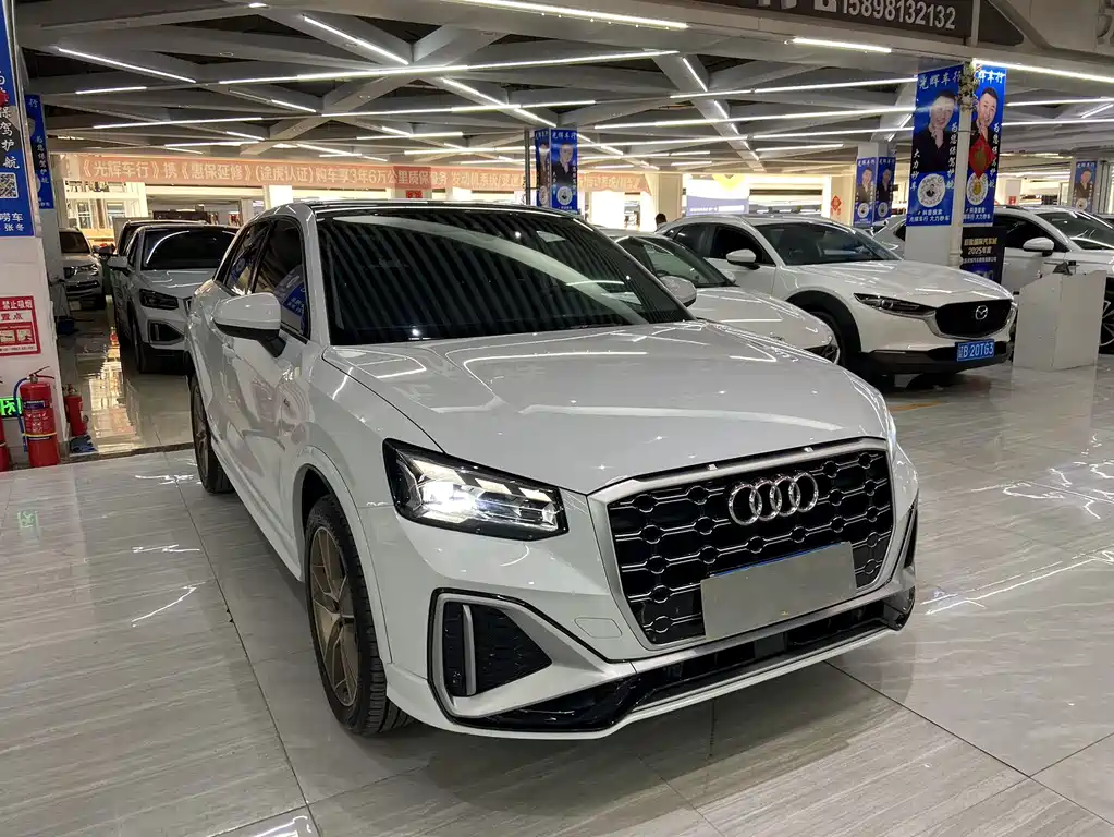 Audi Q2L 2022 — фото 3