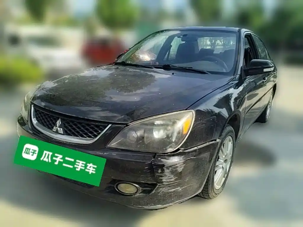 Mitsubishi Лэнс.