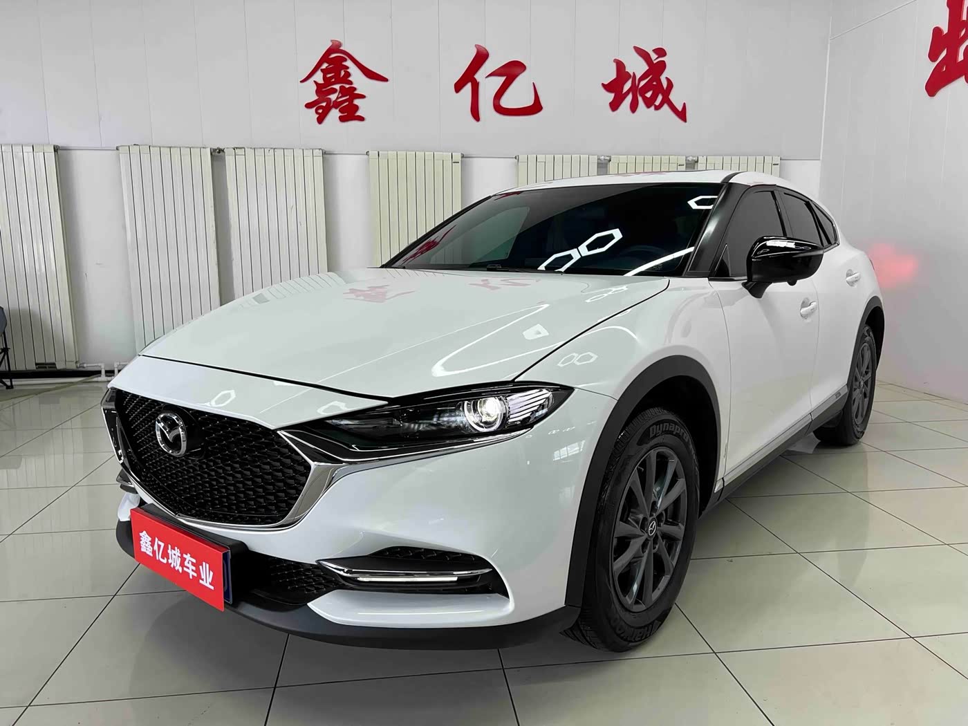 Mazda CX-4 2.0 л 2023 г. Белый, пробег 22000 км