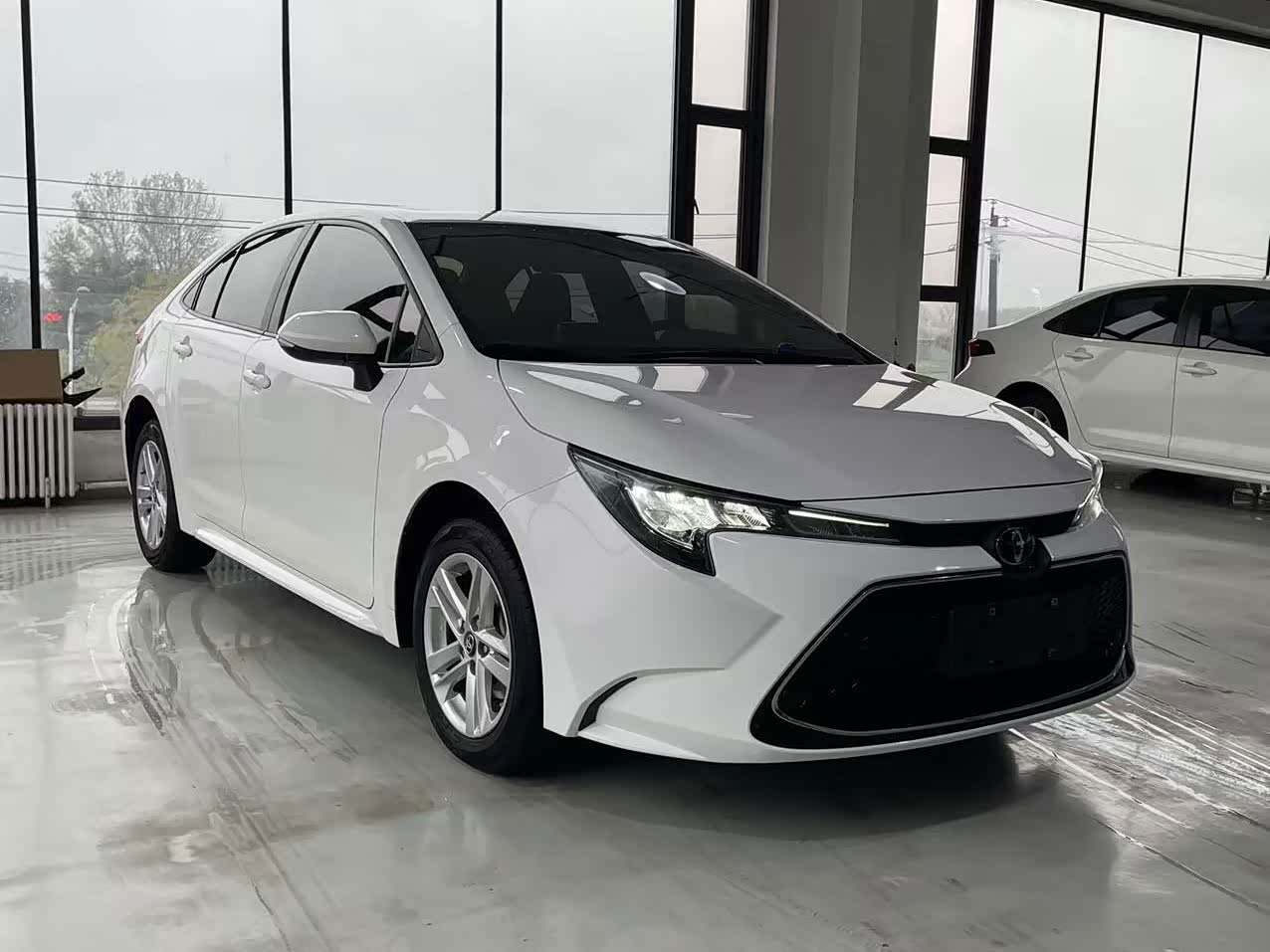 Toyota Levin 1.2 л 2023 г. Белый, пробег 12800 км