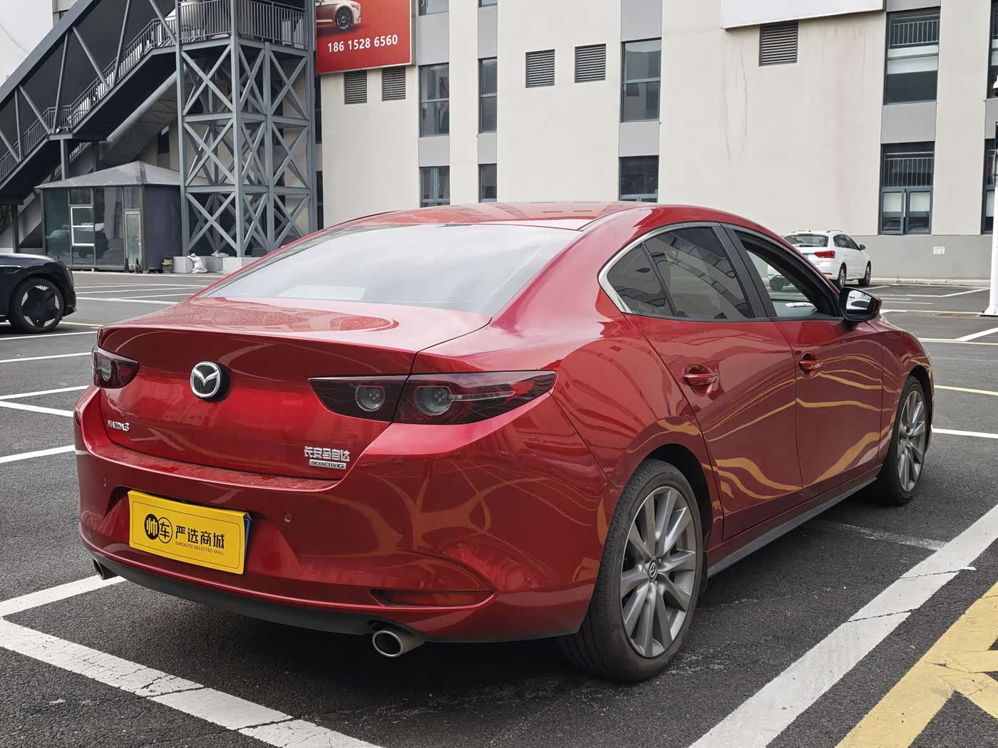 Mazda Mazda3 Axela 2.0 л 2024 г. красный/фиолетовый, пробег 20600 км