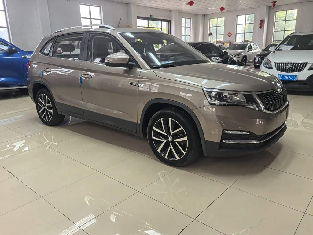 Skoda Kamiq 1.5 л 2022 г. желто-оранжевый, пробег 23000 км