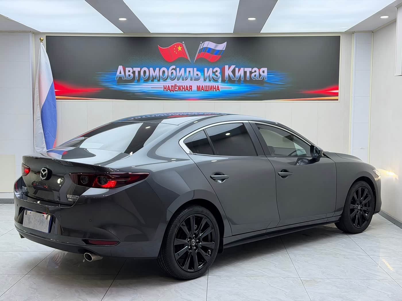 Mazda Mazda3 Axela 2.0 л 2023 г. Серебристо-серый, пробег 16700 км