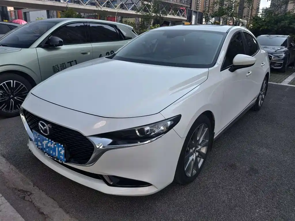 Mazda 3 Axela - фото 3