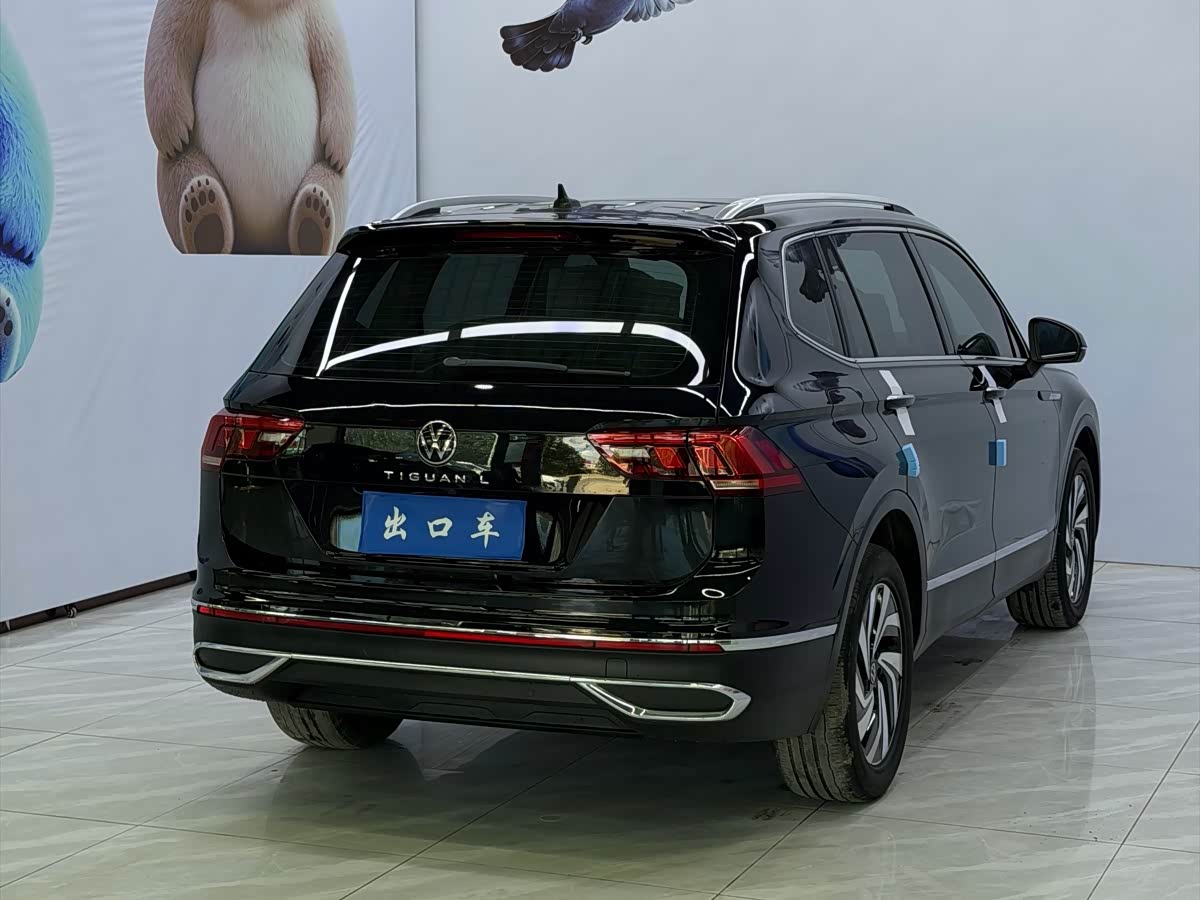 Volkswagen Tiguan L 1.4 л 2023 г. Чёрный, пробег 38500 км