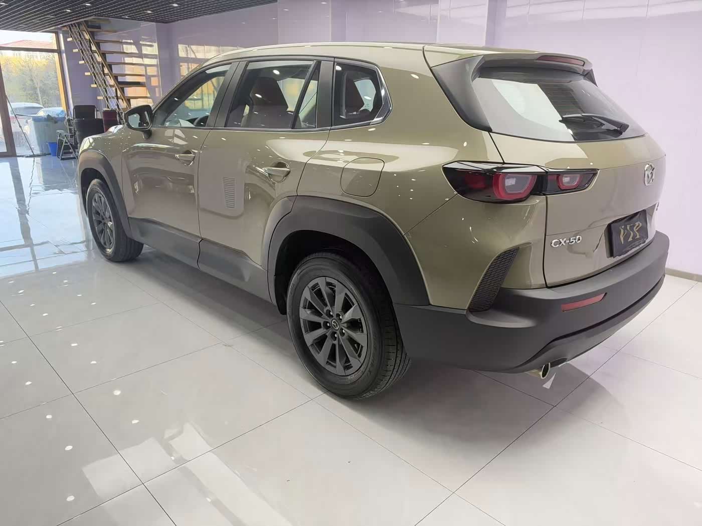 Mazda Mazda CX-50 Xingye 2.0 л 2023 г. шампань/коричневый, пробег 30000 км