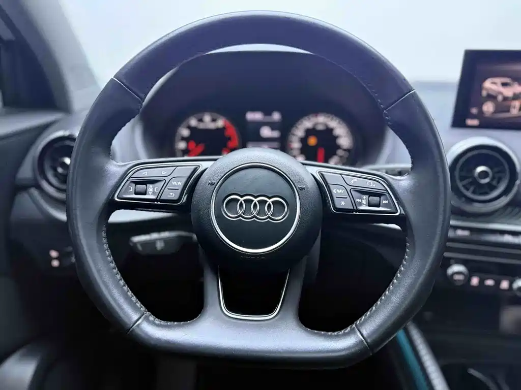 Audi Q2L 2022 — фото 10