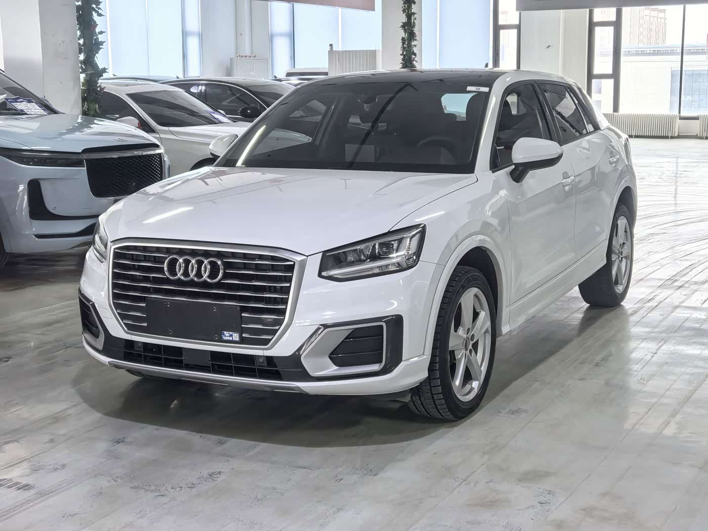 Audi Q2L 1.4 л 2021 г. Белый, пробег 28500 км
