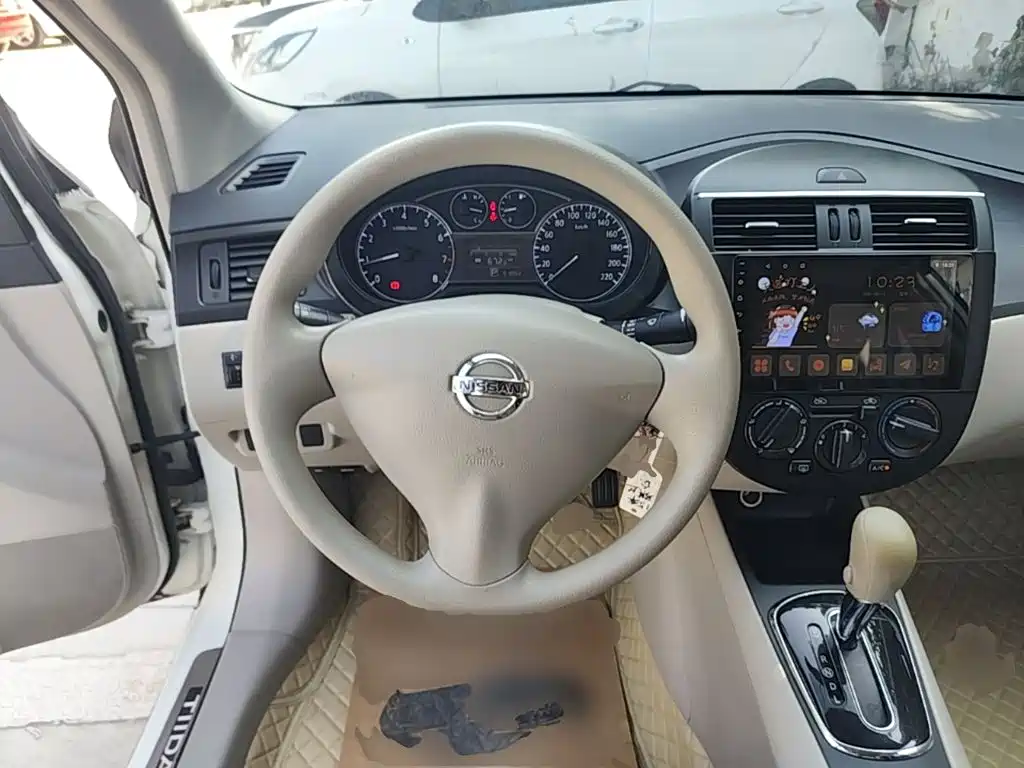 Nissan Tiida — миниатюра 11