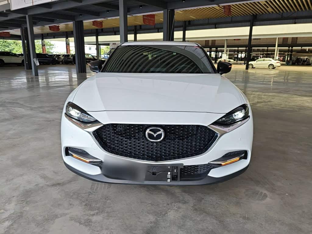 Mazda CX-4 2.0 л 2021 г. Белый, пробег 29500 км