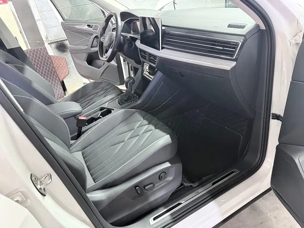 Volkswagen Tiguan L - фото 21