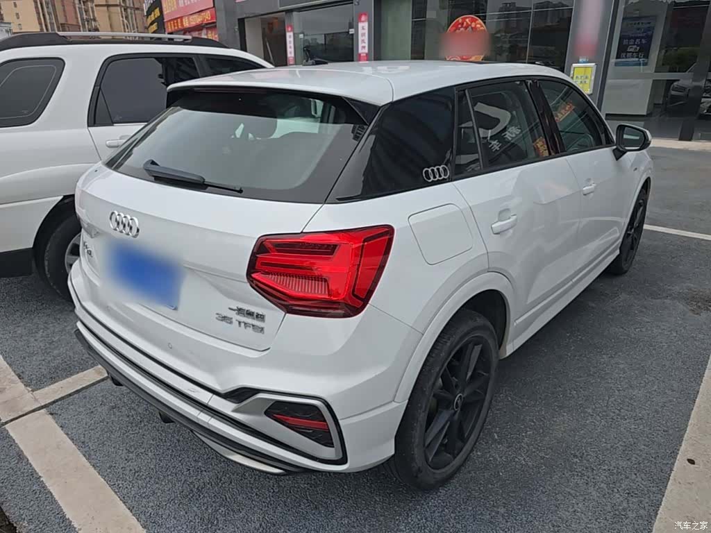 Audi Q2L, 2023 7