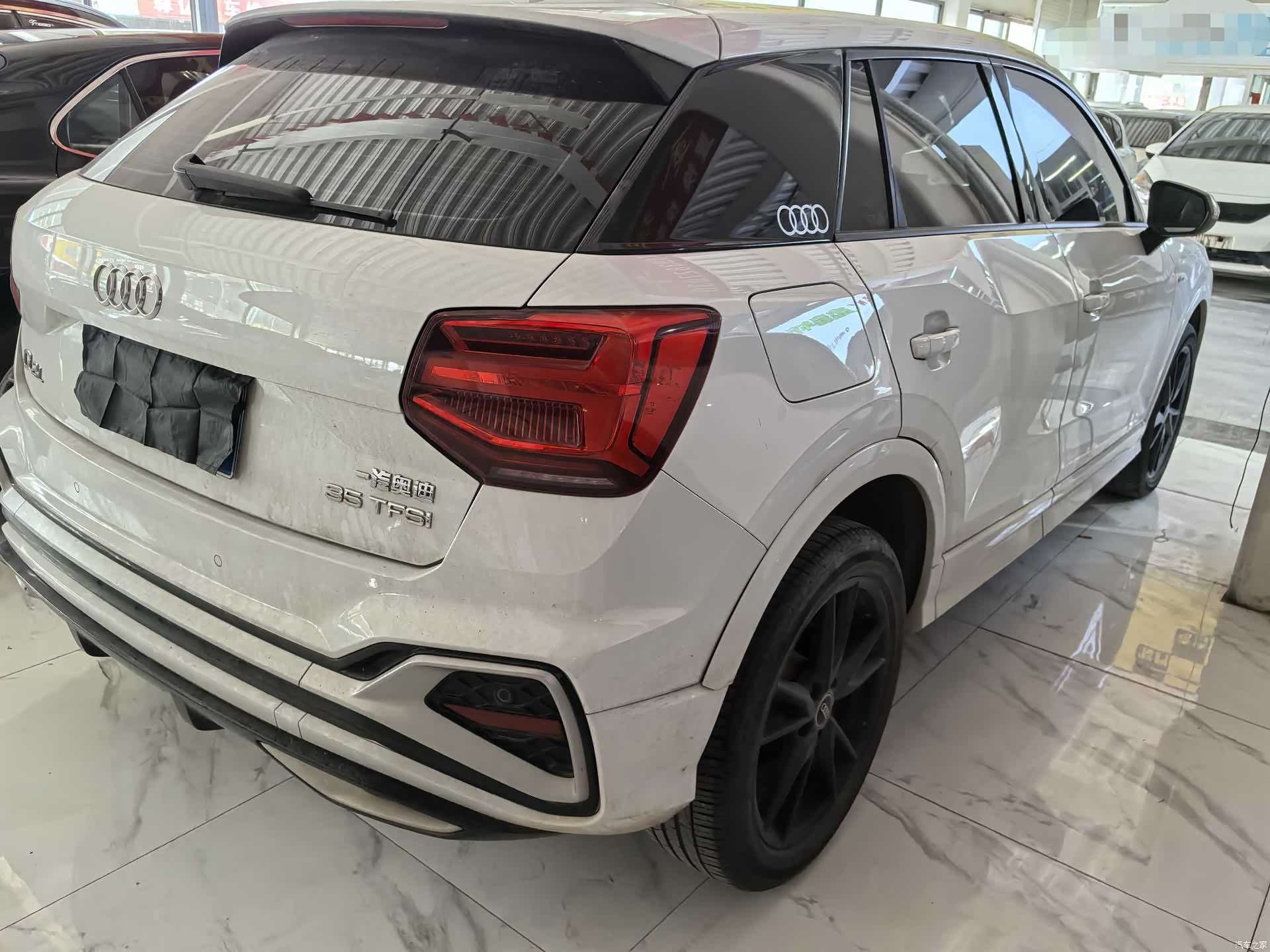 Audi Q2L, 2023 все фото